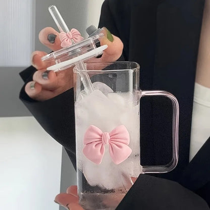 Korean-style glass mug with bow and straw lid, suitable for coffee cups