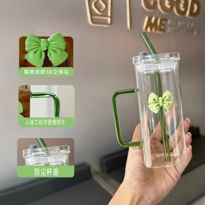 Korean-style glass mug with bow and straw lid, suitable for coffee cups