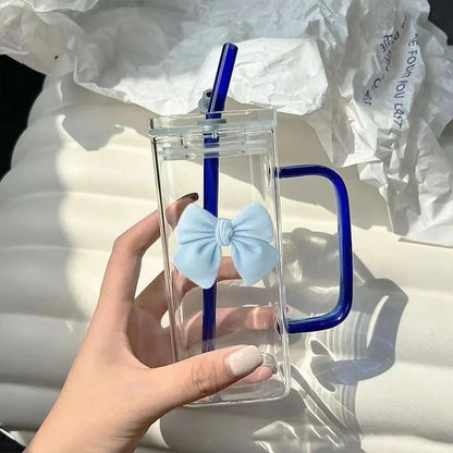 Korean-style glass mug with bow and straw lid, suitable for coffee cups
